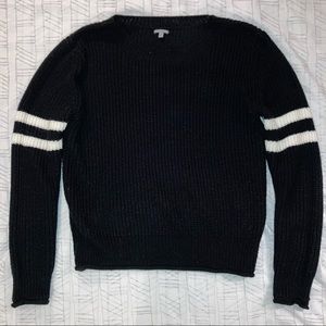 Black with white stripes of sleeves sweater